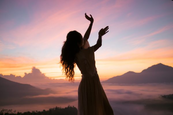 The,Girl,Is,Dancing,On,The,Background,Of,The,Mountains